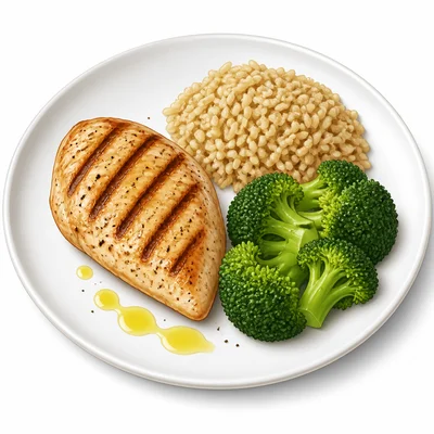 A lunch plate with grilled chicken, brown rice, broccoli, and olive oil.