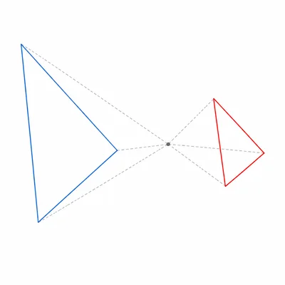 A triangle and a half-size similar image triangle showing dilation by a scale factor less than one.