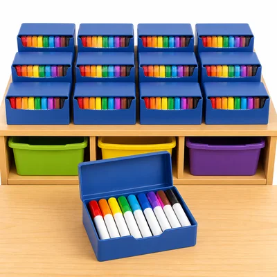 A classroom supply shelf with many marker boxes and one open box showing markers inside.