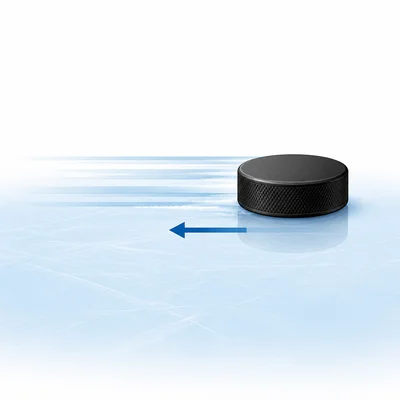 A hockey puck sliding on ice with a small opposing friction arrow.