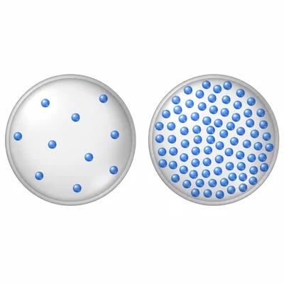 Two same-size balls, one with sparse particles and one with tightly packed particles.