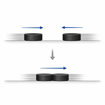 Two pucks moving toward each other collide and stick.